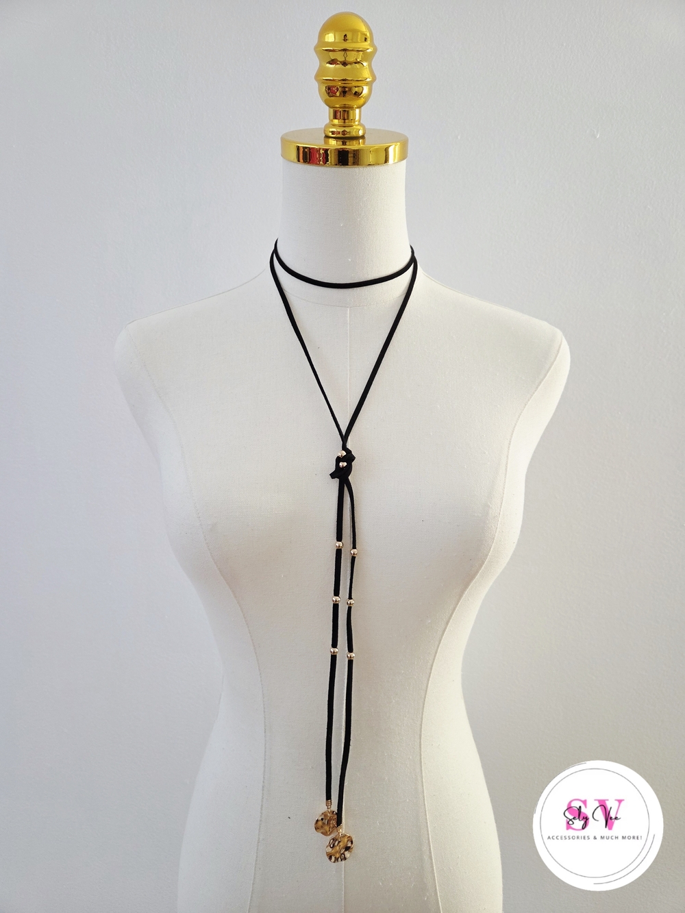 Black choker with gold details